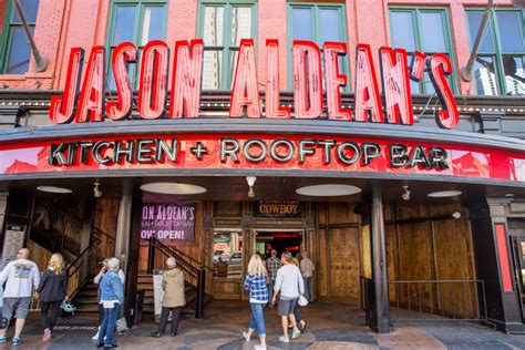 Jason aldean bar nashville - May 17, 2018 · By Hannah Barnes - May 17, 2018 03:15 pm EDT. 1. Following a trend set by a number of country stars, Jason Aldean is opening his own bar in downtown Nashville. Jason Aldean 's Kitchen + Rooftop Bar will open in Music City in June. The bar, which was created in partnership with TC Restaurant Group, promises music on every floor, a one-of-kind ... 